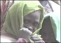 Amnesty International image:
Darfur, child with headscarfe.