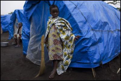 Imani Neema (7)
sweeping in Tchomia Camp.