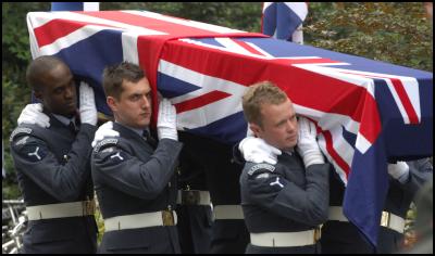 The Queens Color
Squadron Carry the coffin of Stirling crew to the grave side
