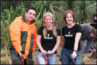 Tree Planting in
Action - Nick Turoa Community Relations Ranger, Sarah
Christie NZONE Sales Manager and Kellie Haveman NZONE
Pilot.