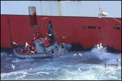 Boarding crew
alongside one of the boarded fishing vessels. Photo: NZDF
Official