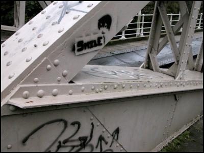 tagging, stencils
on old bridge, Wylam