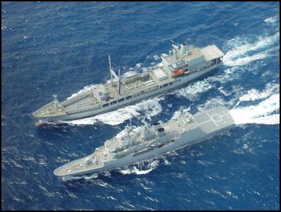 HMNZS TE KAHA
(front) and HMNZS ENDEAVOUR conduct a Replenishment At Sea.
