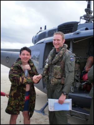 SAR pilot FLTLT Dan
Pezaro from No. 3 Squadron with rescued French tourist
Christopher Courtarb.
