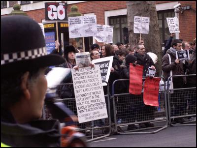 Police and protests
outside Julian Assange trial