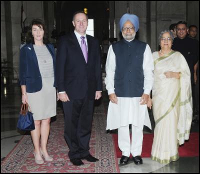 The Indian Prime
Minister, Dr. Manmohan Singh with the Prime Minister of New
Zealand, Mr. John Key, at his ceremonial reception, at
Rashtrapati Bhawan, in New Delhi on June 28, 2011. Smt.
Gursharan Kaur and Mrs. Bronagh Key are also seen. Photo
credit:  PIB & Bharat-Darshan, Hindi magazine from New
Zealand