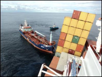 Image credit:
Maritime New Zeland. The tanker Awanuia nears closer to the
stricken cargo vessel Rena. - 6.15pm 9
October