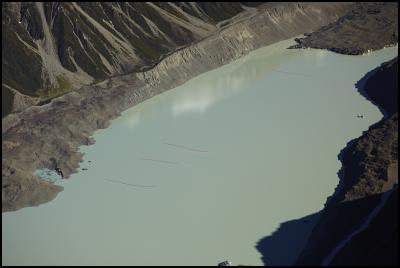 Lines in the Tasman
Glacier terminal lake demonstrate the extent of its retreat
in recent years.  Please credit Mike Langford 