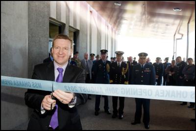 Minister of
Defence, Dr. Jonathan Coleman cuts the ribbon at the opening
the new MSS building.