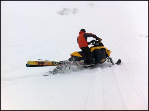 Jason Collins makes
the most of the snow on his snowmobile. Photo: Blair
James.