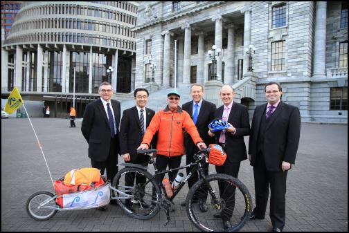 Meeting up with
Graham Frith, cyclist campaigner for prostate cancer
awareness on the forecourt of Parliament. From left; Scott
Simpson, Jian Yang, Graham Frith, Dr Paul Hutchison, Tony
Ryall and  Paul Foster-Bell.