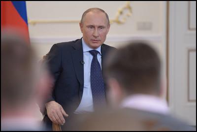 Vladimir Putin at a
meeting with media representatives. 