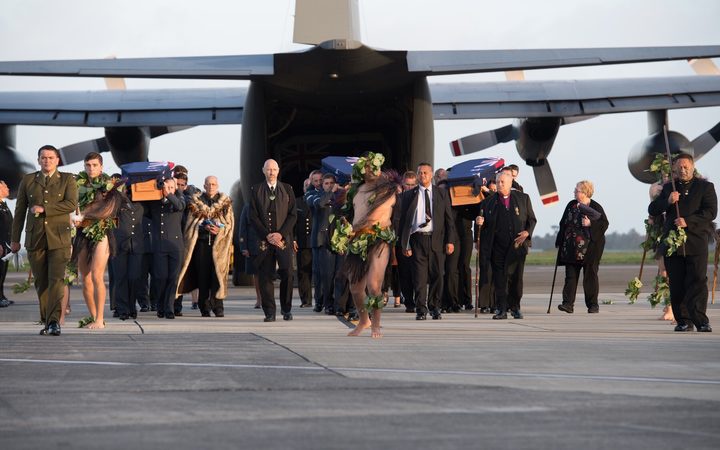 The remains of
three servicemen are handed over to families after being
returned from Suva and Pago Pago in an earlier ceremony in
May. Photo: Supplied / NZDF