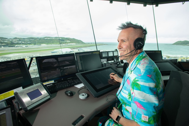 Senior Wellington
air traffic controller Nathan O'Keeffe sits on position in
the new Wellington air traffic control tower.