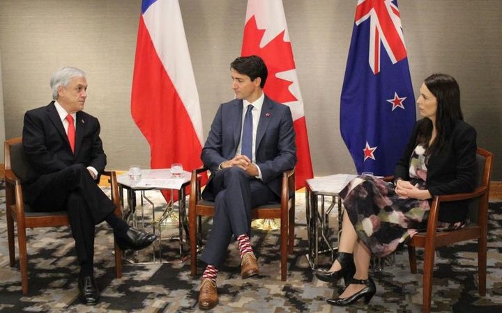 Chilean President
Sebastian Pinera and Canada's Prime Minister Justin Trudeau
meeting Prime Minister Jacinda Ardern. Photo: Pool