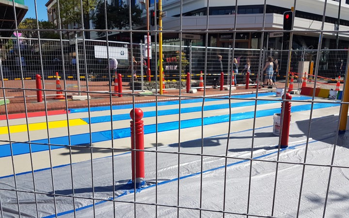 The rainbow
crossing in Wellington when it was being painted. Photo: RNZ
/ Katie Doyle 