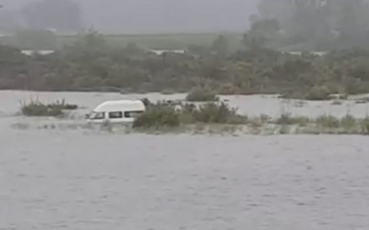 half submerged
camper van