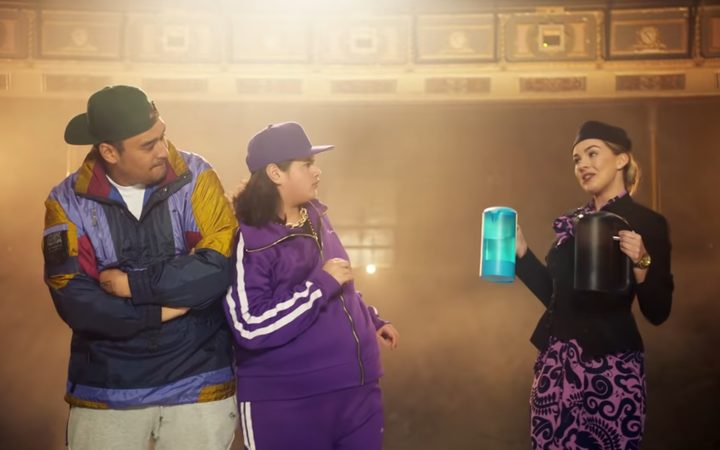 Kings, Julian
Dennison, and an Air New Zealand flight attendant in a
theatre space or something