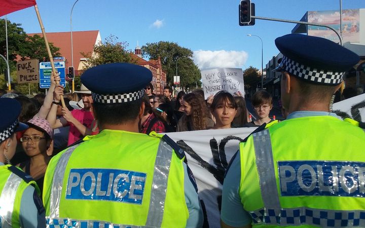 police blocking
protestors