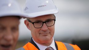 Phil Twyford in a
hard hat and safety vest