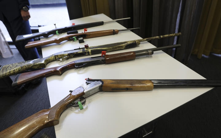 various rifles on a
table