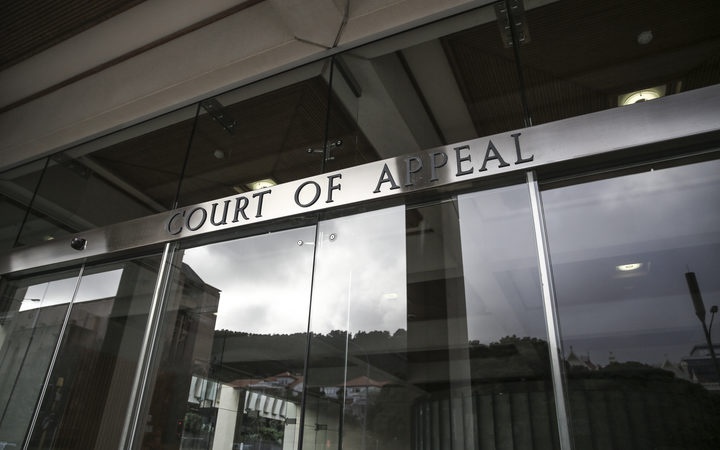 glass building
frontage with brass lettering saying Court of Appeal above
the sliding doors