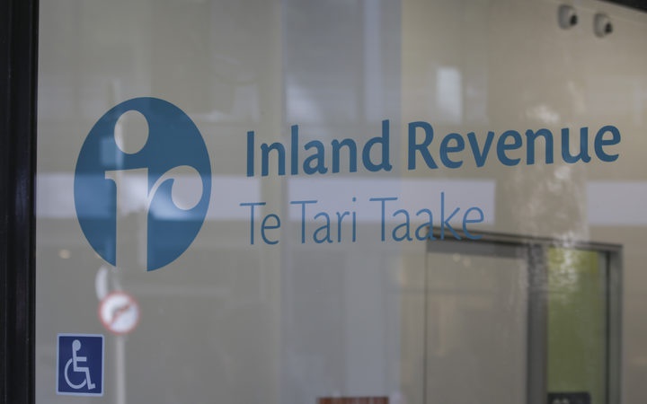 a window with
Inland Revenue sign writing