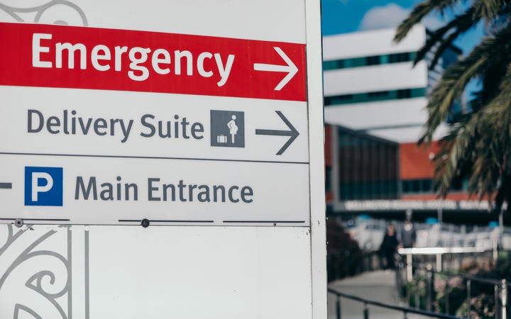 a sign at the car
entrance to Wellington Hospital, showing EMERGENCY
prominently